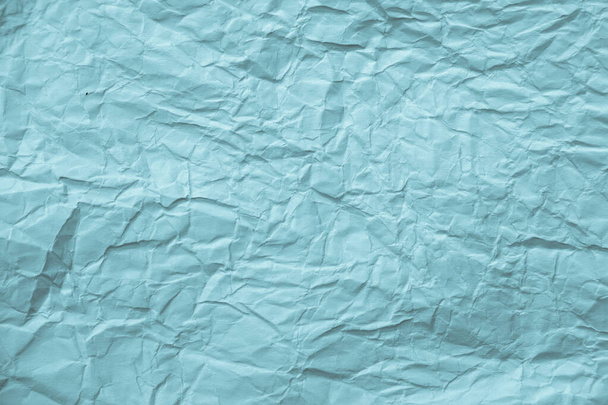 Blue crumpled paper texture. Natural background, design element. - 写真・画像