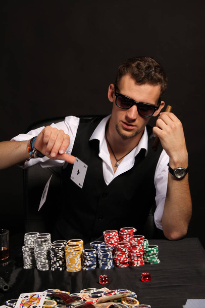poker player in casino with chips and cards - Foto, immagini