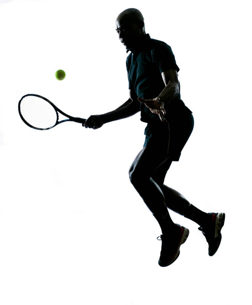 man african afro american playing tennis player forehand on studio isolated on white background - Фото, зображення
