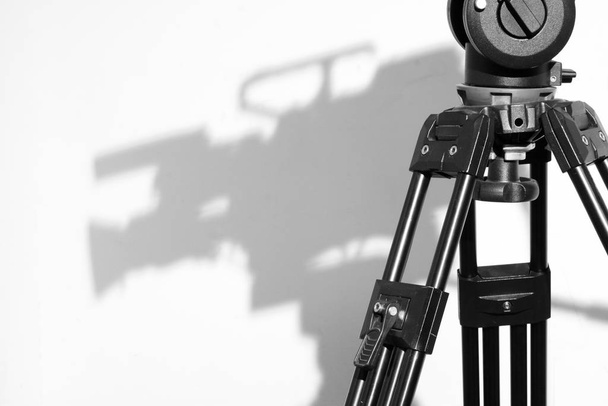 Professional Video Tripod with shadow of Camera - Φωτογραφία, εικόνα