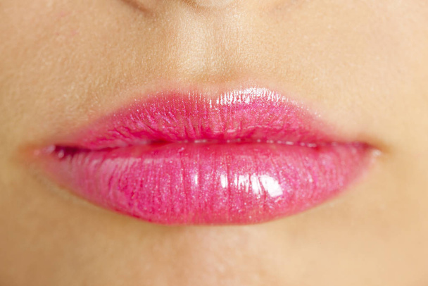 pink lipstick on lips - Photo, image