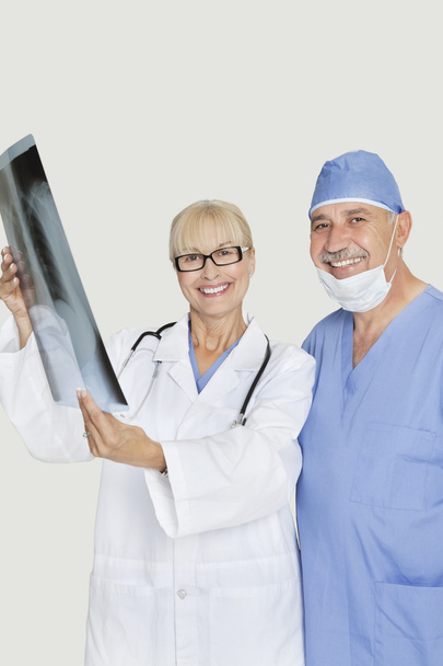 Senior male surgeon and female doctor - Photo, Image