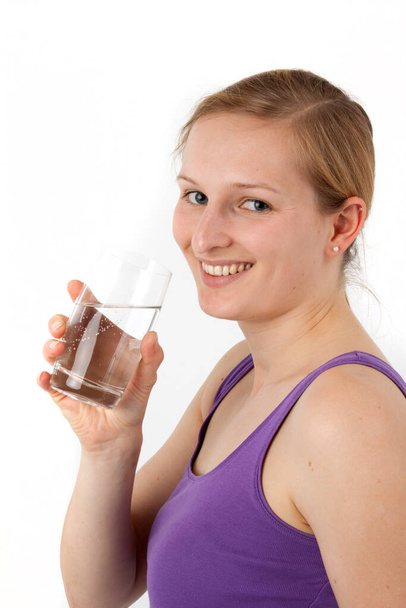young woman drinking water from a glass - Foto, Imagem