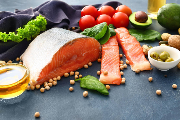Healthy products rich in omega-3 on color background - Photo, image