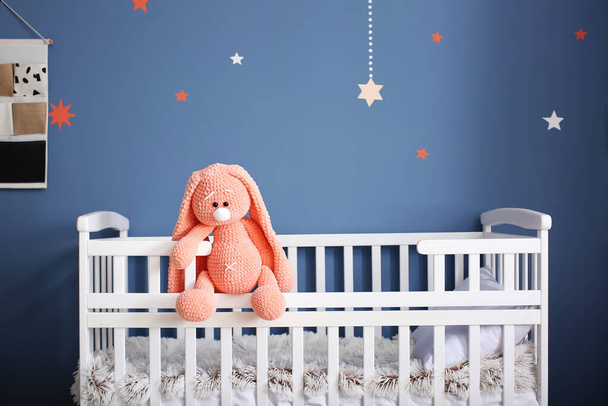 Cute baby toy on crib - Fotó, kép