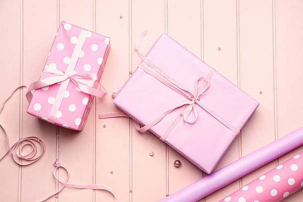 Packed gifts on wooden background - Photo, Image