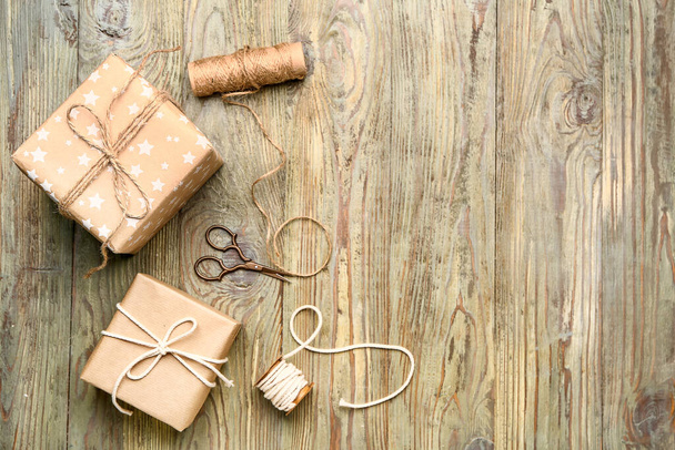 Packed gifts on wooden  background - Foto, Imagen