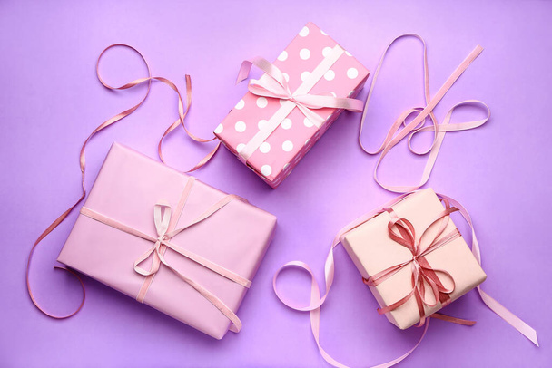 Packed gifts on color background - Foto, immagini