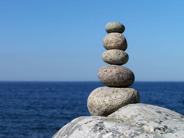 stack of stones on the beach - 写真・画像