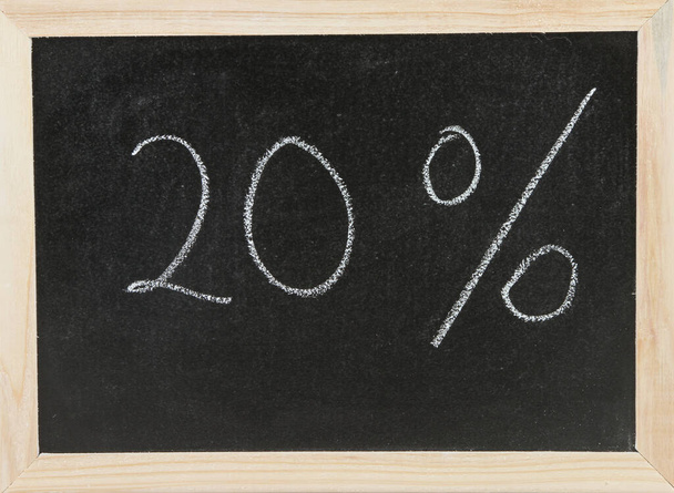 Black chalk board with wooden framed surround and the symbols for Twenty percent. - Zdjęcie, obraz