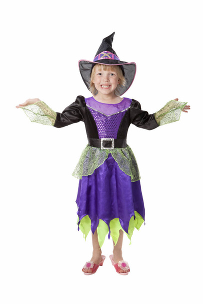 Little girl dressed like a pretty witch - 写真・画像