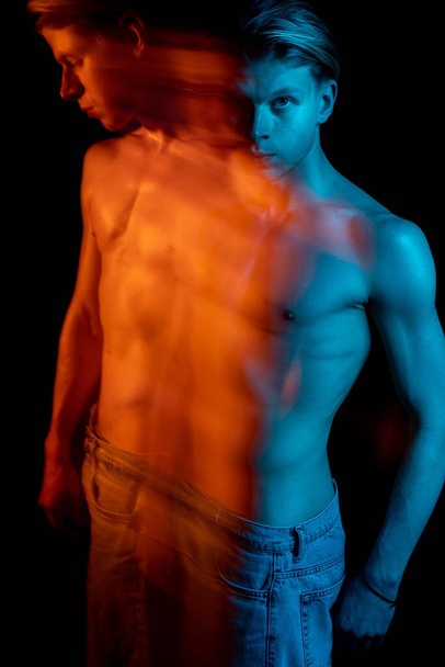 expressive look young naked torso man portrait. Long exposure tension. Ghost. abstract conceptual artistic view. representation of subconscious feelings, doubts and thoughts. complimentary teal orange - Foto, Bild