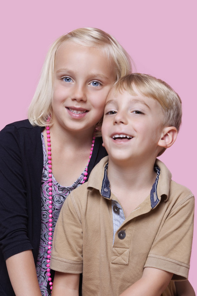 Happy young boy with sister - Фото, зображення