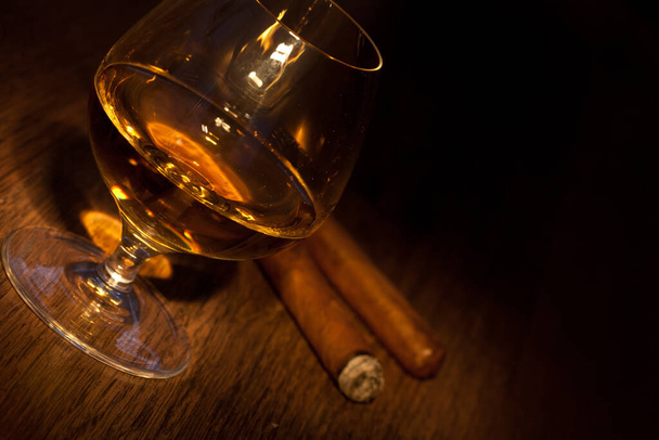 typical havana cigars with pure whiskey drink background - Photo, image