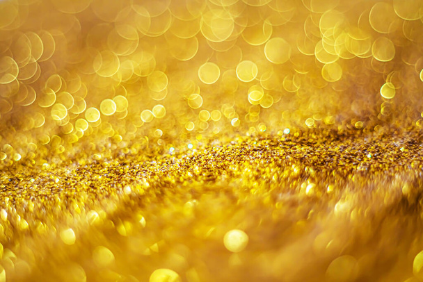 Glitter light abstract gold bokeh blurred background  - Foto, Bild