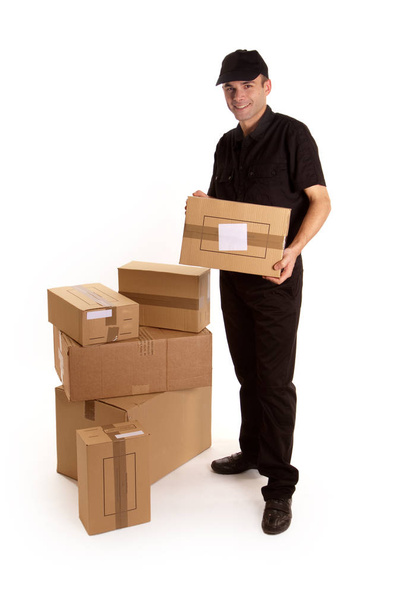 man with a cardboard box on a white background - Foto, Bild