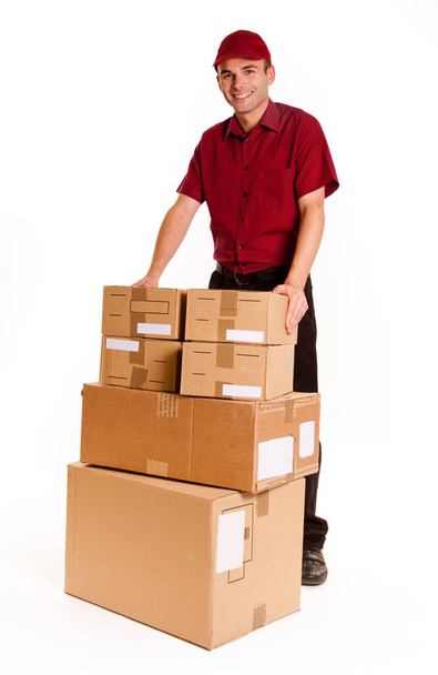 delivery man with cardboard boxes on white background - Фото, изображение