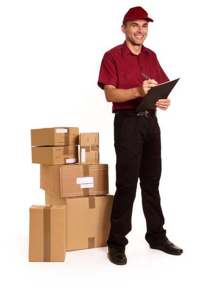 delivery man holding a package - Zdjęcie, obraz