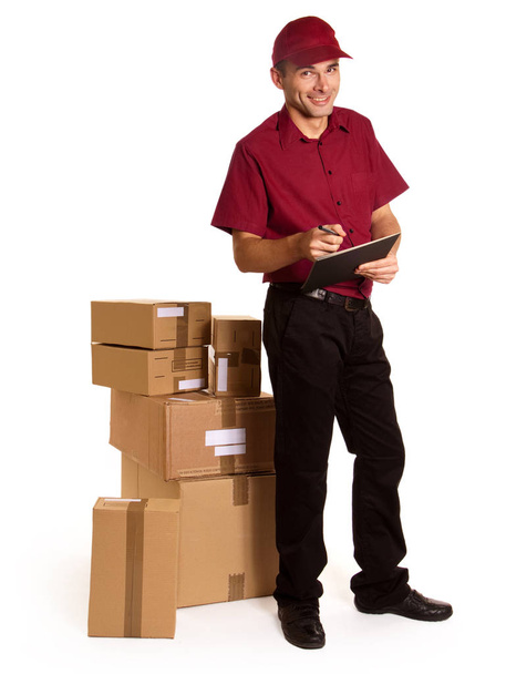delivery man delivering package to recipient - Foto, Bild
