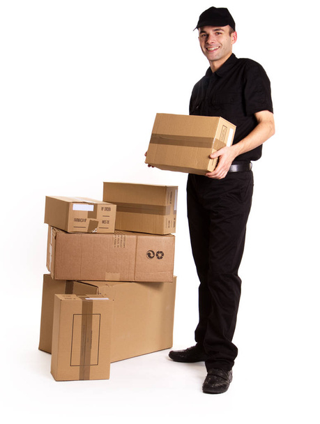 delivery man with cardboard boxes on white background - Foto, Imagen