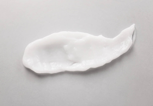 Sample of cream on light background - Фото, зображення