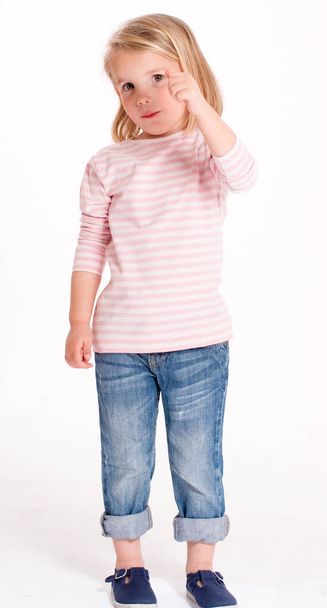  little adorable girl in stylish clothe, posing on camera - Фото, зображення