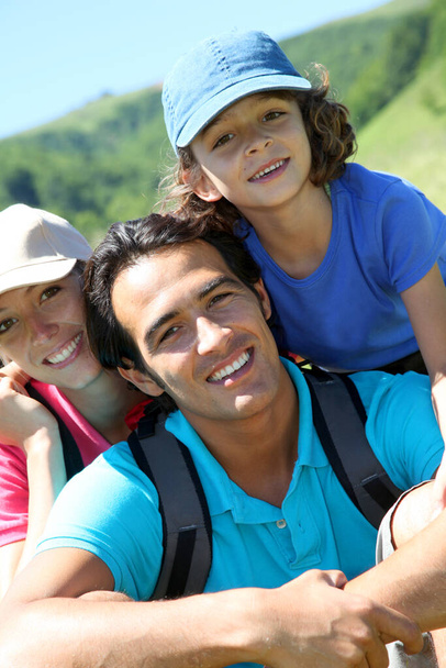 Portrait of happy family in summer vacation - Photo, image