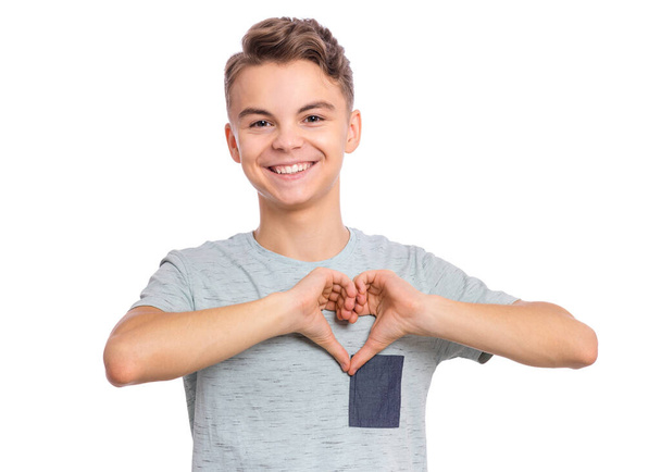 Teen boy making heart hands - Foto, Imagem