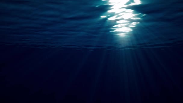 víz alatti lövés az óceáni hullámok oszcillál, és áramlik a fénysugarak létrehoz egy gyönyörű fátyol, álló napfény. 3D renderelés animáció víz alatti fény koncepció 4k videó. - Felvétel, videó