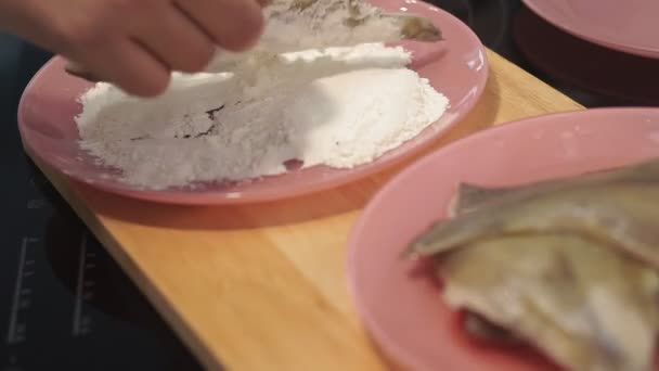 rolls fish fillets in flour. flounder fish. cooking sea fish - Footage, Video