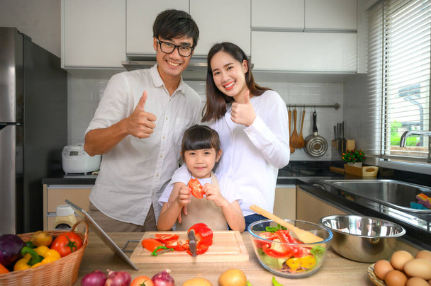 family member enjoy together cooking on line in home holiday - Photo, Image