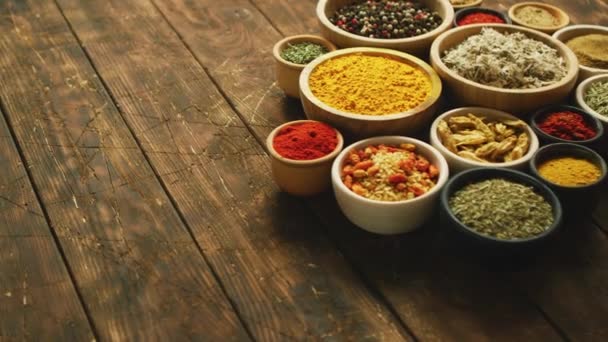 Arrangement of spices in small bowls - Footage, Video