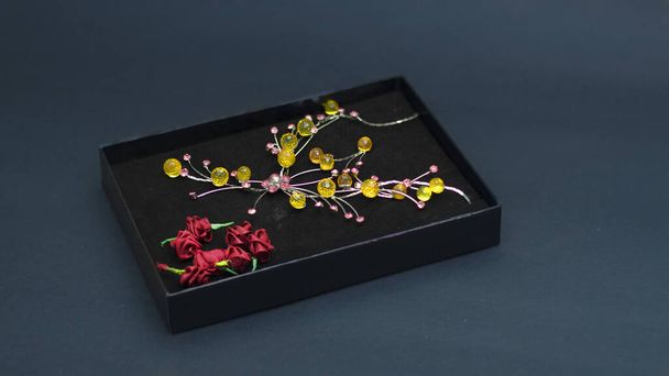 Happy Valentines day, Gift with small rose flower, Jewelery with yellow stone on black box. - Фото, изображение