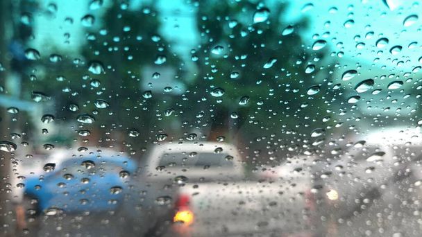 rain droplets on glass window background - 写真・画像