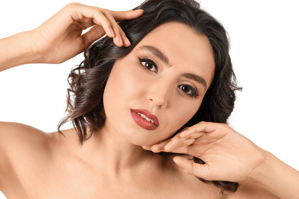Beautiful young woman with stylish makeup on white background - Photo, image