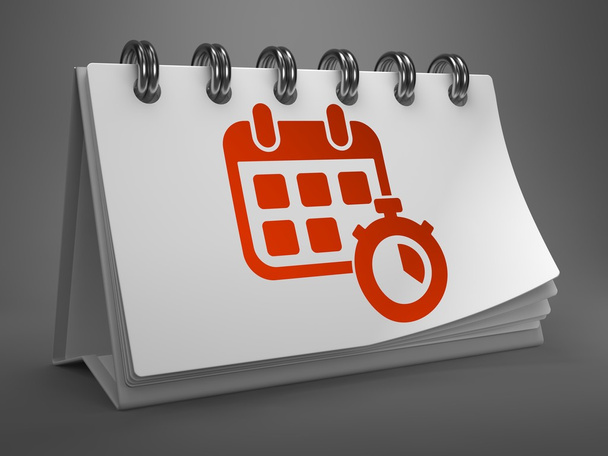 Desktop-Kalender mit rotem Symbol. Zeitkonzept. - Foto, Bild