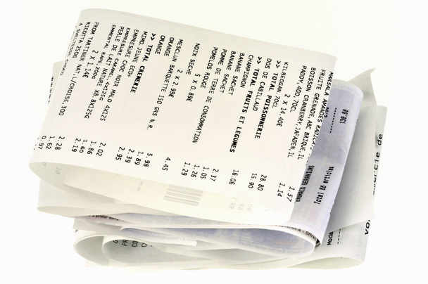 Cash receipt folded close-up on white background  - Photo, Image