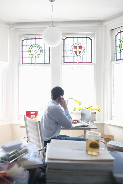 Businessman working at desk  - Photo, Image
