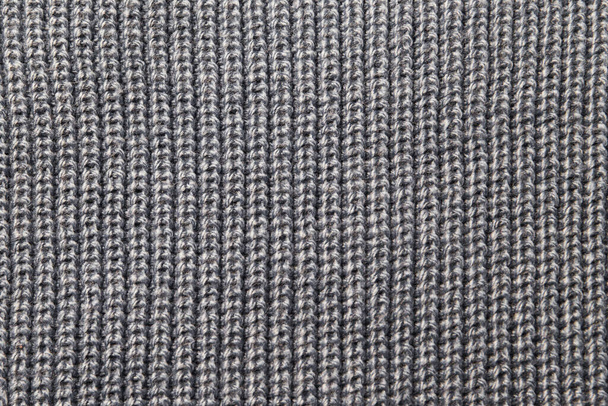 Knitted fabric wool texture close up as a background. - Fotografie, Obrázek