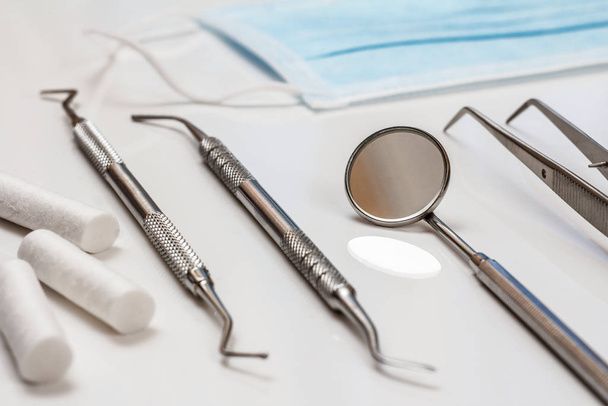 Set of metal dental instruments for teeth dental care - Fotó, kép