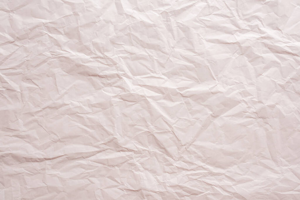 wrinkled pink paper background - Foto, afbeelding