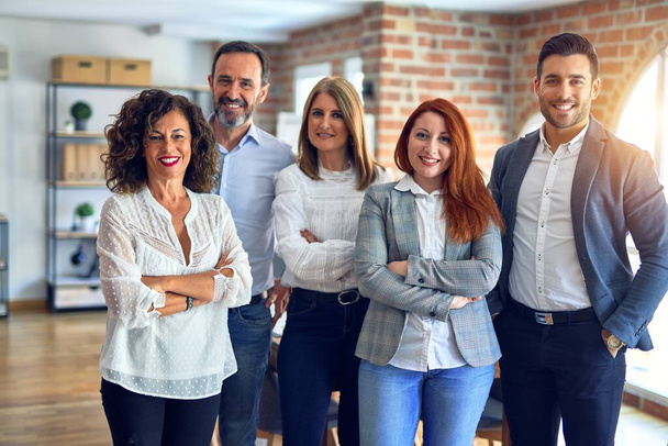 Group of business workers smiling happy and confident. Posing together with smile on face looking at the camera at the office - Φωτογραφία, εικόνα
