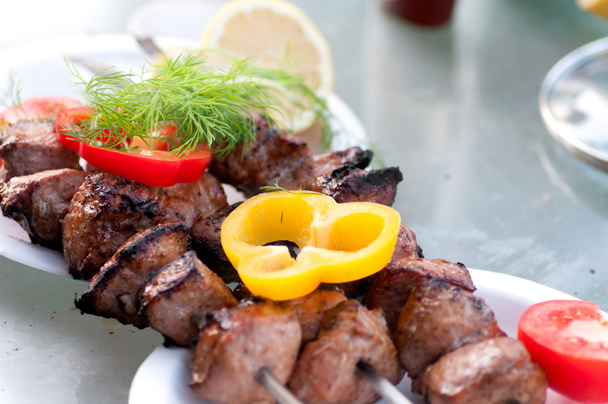 fried skewers served with pepper and dill - Φωτογραφία, εικόνα