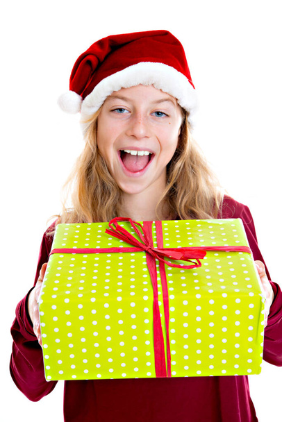 nice girl with Santa- cap and present - Foto, Imagen