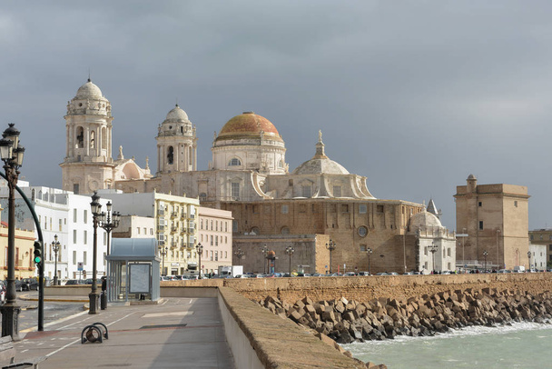 Promenade and Cathedral of Santa Cruz in Cadiz, Spain.  - Fotó, kép