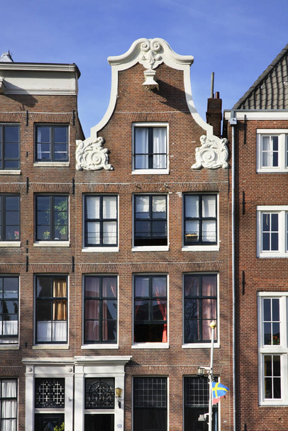 Fragment of old building in Amsterdam. Netherlands - Foto, afbeelding