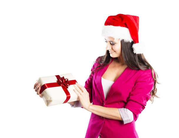 Beautiful woman with christmas gift - Foto, afbeelding