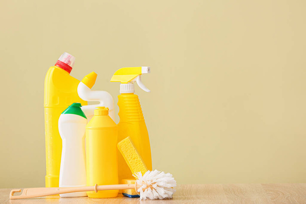Set of cleaning supplies on color background - Фото, зображення