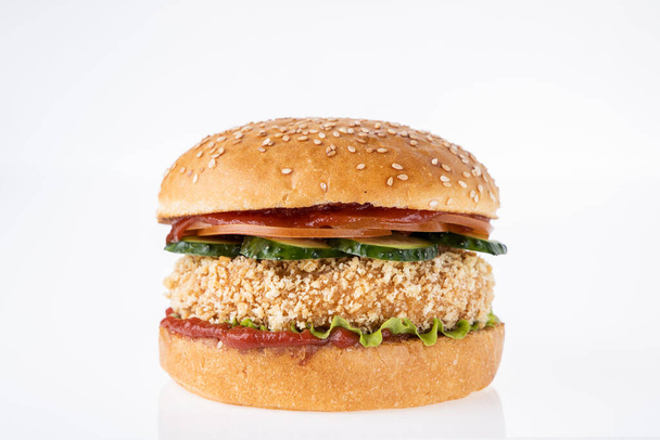 hamburger with chicken cutlet on a light background - 写真・画像