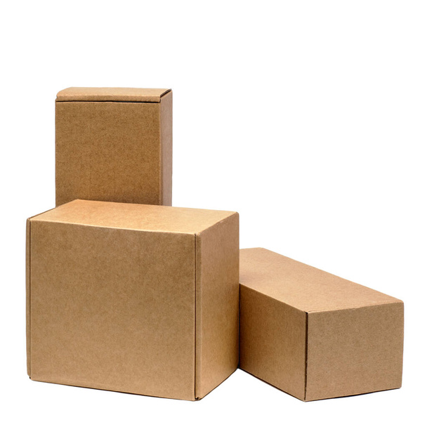 Cardboard boxes for goods on a white background. Different size. Isolated on white background - Zdjęcie, obraz